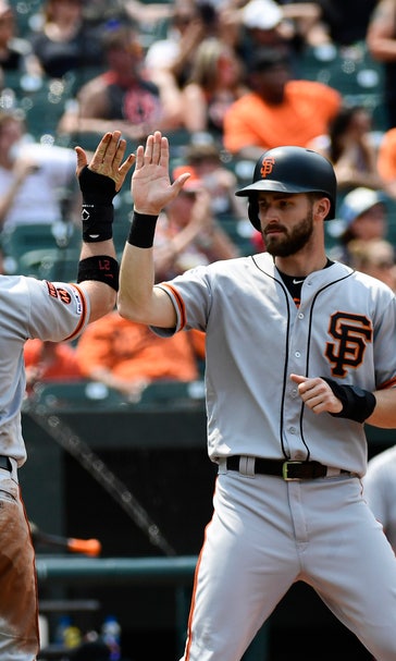 Crawford hits 2 HRs to help Giants breeze past Orioles 8-1